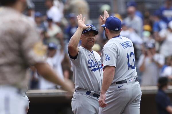 Dodgers 1st team to clinch a playoff spot, rout Padres 11-2