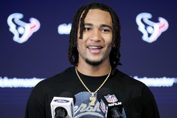 Houston Texans quarterback C.J. Stroud speaks to the media after the team's win over the Tampa Bay Buccaneers in an NFL football game, Sunday, Nov. 5, 2023, in Houston. (AP Photo/Eric Christian Smith)