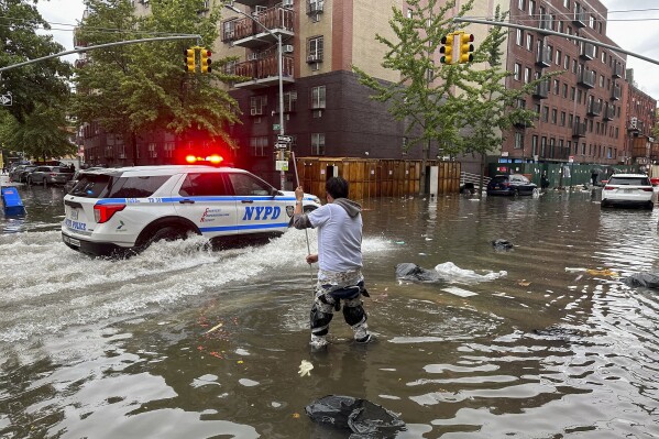 New York flooding: Storm floods NYC, causing traffic, delays | AP News