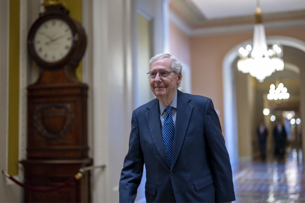 Senate Minority Leader Mitch McConnell, R-Ky., walks to the chamber as the Senate prepares to advance the $95 billion aid package for Ukraine, Israel and Taiwan passed by the House, at the Capitol in Washington, Tuesday, April 23, 2024. (AP Photo/J. Scott Applewhite)