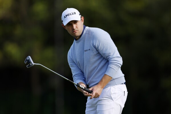 Patrick Cantlay watches his putt on the 13th green during the second round of the Genesis Invitational golf tournament at Riviera Country Club Friday, Feb. 16, 2024, in the Pacific Palisades area of Los Angeles. (AP Photo/Ryan Kang)