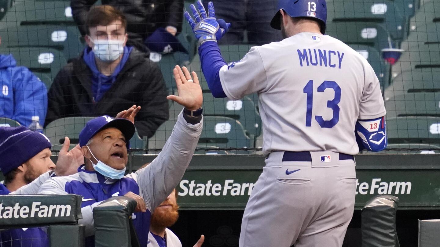 Chicago Cubs' Matt Duffy gives a thumbs-up as he rounds the bases