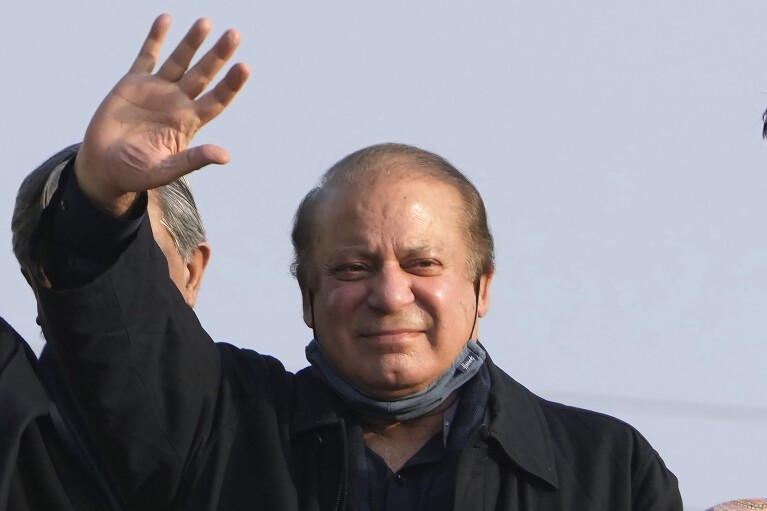 FILE - Pakistan's former Prime Minister Nawaz Sharif waves to his supporters as he arrives to address an election campaign rally in Hafizabad, Pakistan, Thursday, Jan. 18, 2024. Pakistan is holding elections for a new parliament on Thursday. More than 120 million voters in Pakistan get to elect a new parliament on Thursday. The elections are the twelfth in the country's 76-year history, which has been marred by economic crises, military takeovers and martial law, militancy, political upheavals and wars with India. (AP Photo/K.M. Chaudary, File)