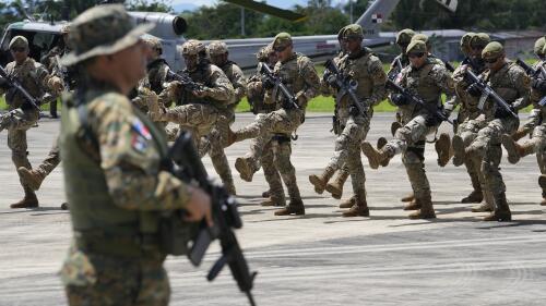 Panamanian border police attend a launch ceremony for Operation Shield in Nicanor, Darien province, Panama, Friday, June 2, 2023. Security officials said Operation Shield is part of the agreement reached with the governments of Colombia and the United States in April to stop the flow of migrants through the border’s jungle-clad mountains known as the Darien Gap. (AP Photo/Arnulfo Franco)