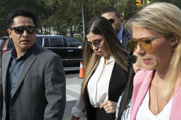 Emma Coronel Aispuro, center, wife of Mexican drug lord Joaquin "El Chapo" Guzman, arrives for his sentencing at Brooklyn federal court, Wednesday, July 17, 2019 in New York. The 62-year-old Guzman was convicted in February on multiple conspiracy counts in an epic drug-trafficking case. (AP Photo/Mark Lennihan)