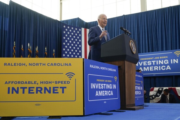 FILE - President Joe Biden speaks in Raleigh, N.C., Jan. 18, 2024. The White House is pressing Congress to extend a subsidy program that helps one in six families afford internet and represents a key element of Biden's promise to deliver reliable broadband service to every American household. "For President Biden. internet is like water," said Tom Perez, senior adviser and assistant to the president, on a call with reporters on Monday. "It's an essential public necessity that should be affordable and accessible to everyone." (AP Photo/Manuel Balce Ceneta, File)