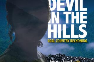 This cover image released by Harmonic Alliance shows "Devil in the Hills: Coal Country Reckoning" by Mary Hott with the Carpenter Ants. (Harmonic Alliance via AP)