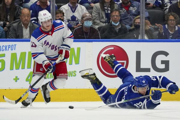 New York Rangers left wing Artemi Panarin (10) looks to pass the puck  during the third period of an NHL hockey game against the Ottawa Senators,  Thursday, March 2, 2023, in New