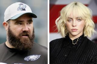 This combination of 2021 photos shows Philadelphia Eagles' Jason Kelce,, left, and Billie Eilish in London. The grammy Award-winning singer-songwriter and Eagles center have something in common, broadcasters have difficulty pronouncing their names. Both Eilish and Kelce, as well as "omicron" made it onto this year's list of most mispronounced words as compiled by the U.S. Captioning Company, which captions and subtitles real-time events on TV and in courtrooms. (Tim Tai/The Philadelphia Inquirer via AP, Pool, Joel C Ryan/Invision/AP)
