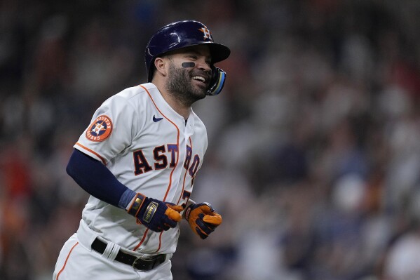 Houston Astros' Jose Altuve runs the bases after hitting a two-run home run against the Tampa Bay Rays during the seventh inning of a baseball game Saturday, July 29, 2023, in Houston. (AP Photo/Kevin M. Cox)