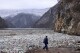 FILE - A crane operator walks next to the waste footing in the Drina river near Visegrad, Bosnia, Jan. 10, 2024. The United Nations Environment Assembly is meeting in Nairobi on Monday, Feb. 26, to discuss how countries can work together to tackle environmental crises like climate change, pollution and loss of biodiversity. (AP Photo/Armin Durgut, File)