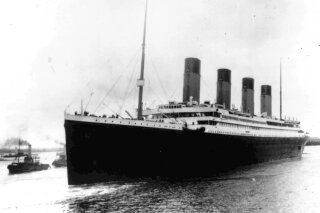 FILE - In this April 10, 1912 file photo the Titanic leaves Southampton, England on her maiden voyage. The U.S. government will try to stop a company's planned salvage mission to retrieve the Titanic’s wireless telegraph machine, arguing the expedition would break federal law and a pact with Britain to leave the iconic shipwreck undisturbed. U.S. attorneys filed a legal challenge before a federal judge in Norfolk, Va, late Monday, June 8, 2020. The expedition is expected to occur by the end of August. (AP Photo/File)