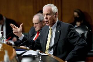 FILE - Sen. Ron Johnson, R-Wis., speaks on Capitol Hill in Washington, on Feb. 8, 2022. Johnson, on Tuesday, March 23, 2022 said it is "creepy" when transgender women are allowed to use women's bathrooms. Johnson, who is up for reelection in November, also objected to transgender women competing in women's sports. (AP Photo/Andrew Harnik, File)