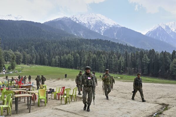 Indian security officers inspect the site where militants indiscriminately opened fired on tourists on Tuesday, in Pahalgam, Indian controlled Kashmir, Wednesday, April 23, 2025. (AP Photo, File)