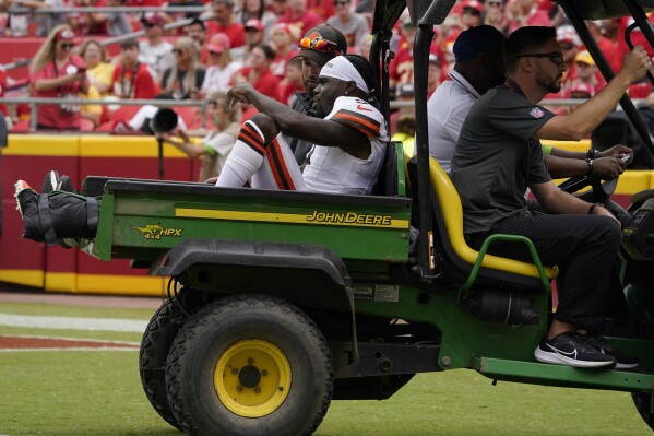 Cleveland Browns' Jakeem Grant Sr. is taken off on a cart after being injured on the opening kickoff during the first half of an NFL preseason football game against the Kansas City Chiefs Saturday, Aug. 26, 2023, in Kansas City, Mo. (AP Photo/Ed Zurga)
