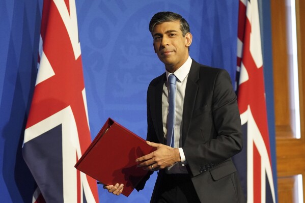 Britain's Prime Minister Rishi Sunak leaves following a press conference in Downing Street in London, Thursday Jan. 18, 2024. Sunak quelled a Conservative Party rebellion and got his stalled plan to send some asylum-seekers on a one-way trip to Rwanda through the House of Commons on Wednesday. (Stefan Rousseau/Pool Photo via AP)