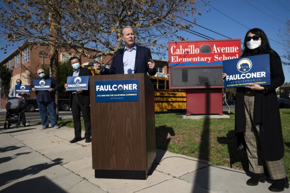 Former San Diego Mayor Kevin Faulconer, center, speaks during a news conference in Tuesday, Feb. 2, 2021, in the San Pedro section of Los Angeles. Faulconer announced Monday he is entering the race for California governor, the first major Republican to formally step into the contest while a potential recall election aimed at Democratic Gov. Gavin Newsom moves closer to qualifying for the ballot this year. (AP Photo/Jae C. Hong)
