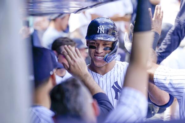 New York Yankees' Aaron Judge celebrates after hitting a two-run home run during the second inning of a baseball game against the Kansas City Royals, Saturday, July 30, 2022, in New York. (AP Photo/Mary Altaffer)