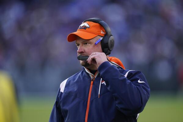 Denver Broncos head coach Nathaniel Hackett directs his team from the sideline, in the second half of an NFL football game against the Baltimore Ravens, Sunday, Dec. 4, 2022, in Baltimore. (AP Photo/Patrick Semansky)