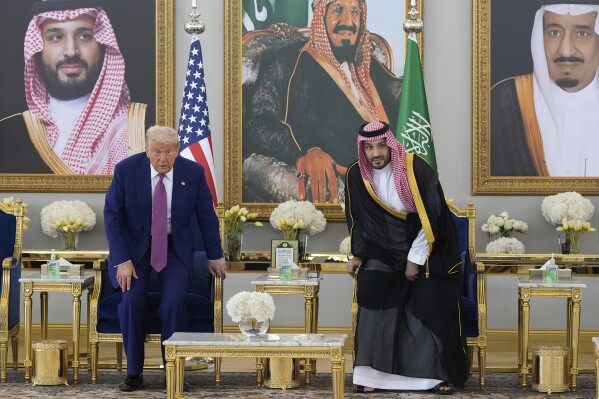 President Donald Trump arrives with Saudi Crown Prince Mohammed bin Salman for a coffee ceremony at the Royal Terminal of King Khalid International Airport in Riyadh, Saudi Arabia, Tuesday, May 13, 2025. (AP Photo/Alex Brandon)