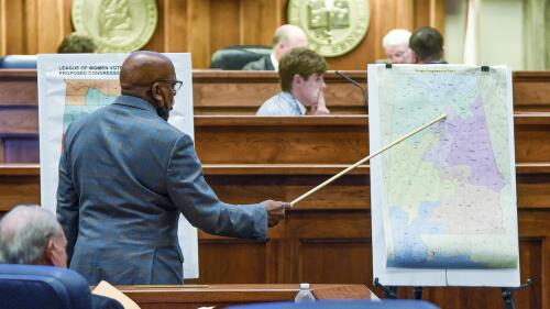 FILE - Sen. Rodger Smitherman compares U.S. Representative district maps during the special session on redistricting at the Alabama Statehouse in Montgomery, Ala., Nov. 3, 2021. The U.S. Supreme Court ruled Thursday, June 8, 2023, that Alabama’s U.S. House districts violated the federal Voting Rights Act by diluting the political power of Black voters.(Mickey Welsh/The Montgomery Advertiser via AP, File)