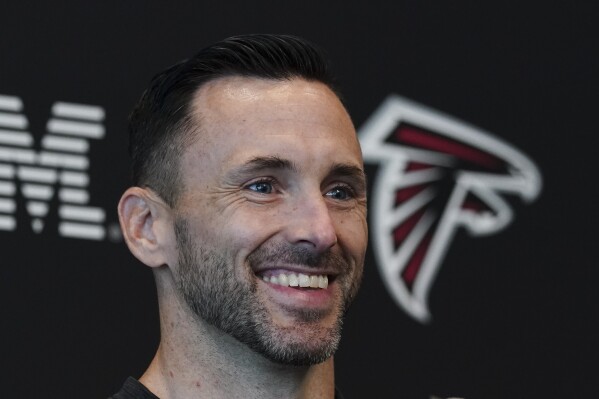 Atlanta Falcons assistant general manager Kyle Smith speaks to the media before the first day of team's NFL football training camp pratice Wednesday, July 26, 2023, in Flowery Branch, Ga. (AP Photo/John Bazemore)