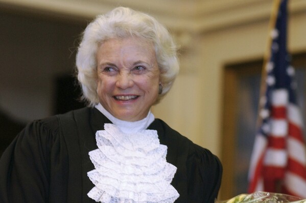 FILE - U.S. Supreme Court Justice Sandra Day O'Connor is shown before administering the oath of office to members of the Texas Supreme Court, Jan. 6, 2003, in Austin, Texas. O'Connor, who joined the Supreme Court in 1981 as the nation's first female justice, has died at age 93.(AP Photo/Harry Cabluck, File)