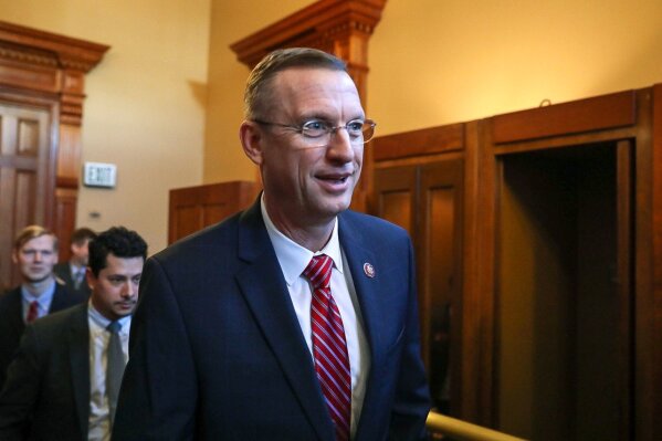 Georgia Rep. Doug Collins walks with colleagues at the state capitol in Atlanta, Tuesday, Jan. 28, 2020.  Collins announced that he's running for the U.S. Senate seat held by a fellow Republican, setting up a battle that could divide the state party this election year. Collins made the announcement Wednesday, Jan. 29, 2020 on Fox & Friends. (Riley Bunch/The Daily Times via AP)