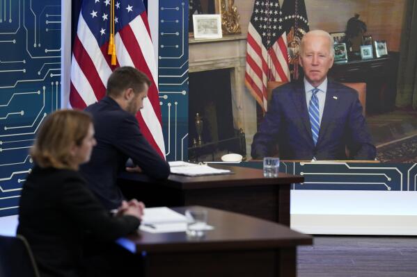 President Joe Biden listens as he attends virtually an event in the South Court Auditorium on the White House complex in Washington, Monday, July 25, 2022. Biden, who continues to recover from his coronavirus infection, spoke virtually with business executives and labor leaders to discuss the Chips Act, a proposal to bolster domestic manufacturing. (AP Photo/Susan Walsh)