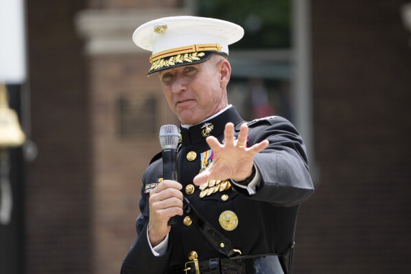 FILE - Acting Commandant of the U.S. Marine Corps Gen. Eric Smith speaks during a relinquishment of office ceremony for U.S. Marine Corps Gen. David Berger on July 10, 2023, at the Marine Barracks in Washington. Defense officials say Gen. Eric Smith is taking steps to return to full duty as commandant of the Marine Corps, about four months after being sidelined due to a heart attack. (AP Photo/Manuel Balce Ceneta, File)