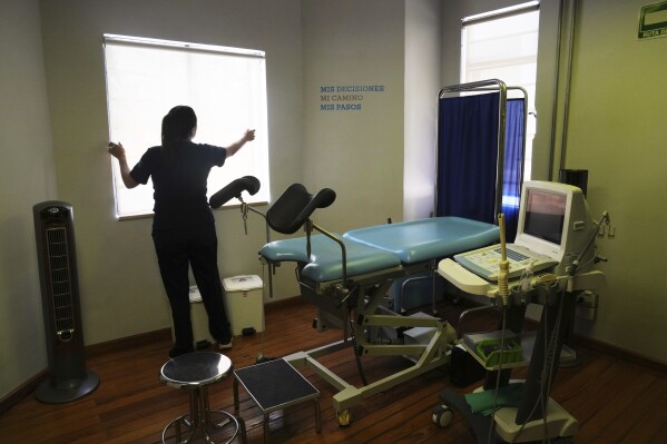 A health worker gives a tour of the MSI Foundation, an organization that offers information and help to women seeking abortions, in Mexico City, Thursday, May 8, 2025. (AP Photo/Marco Ugarte)