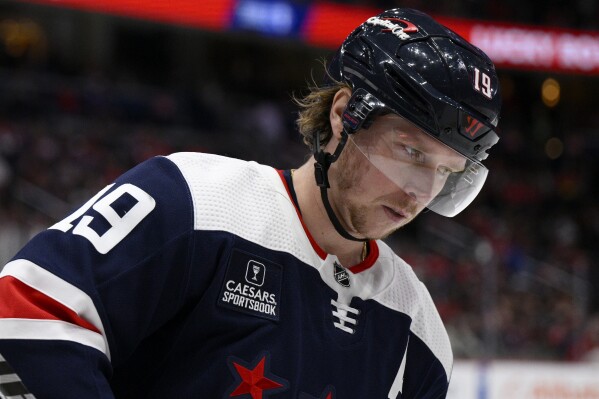 FILE - Washington Capitals center Nicklas Backstrom (19) looks on during the first period of an NHL hockey game against the New York Islanders, Monday, April 10, 2023, in Washington. Backstrom is sick and tired of talking about his surgically repaired left hip. More than a year removed from a surgery that only one previous NHL player had come back from, Washington’s Swedish center insists he’s past the injury and back to normal.(AP Photo/Nick Wass, File)