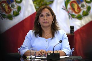 Peruvian President Dina Boluarte gives a press conference at the government palace in Lima, Peru, Friday, Feb. 10, 2023. Peru is in the midst of a political crisis as protestors are seeking Boluarte's resignation and the dissolution of Congress, after former President Pedro Castillo was ousted and arrested for trying to dissolve Congress in December. (AP Photo/Martin Mejia)