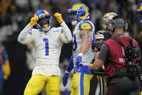 Los Angeles Rams quarterback Bryce Perkins runs the ball during the first  half of an NFL football game against the Kansas City Chiefs Sunday, Nov.  27, 2022, in Kansas City, Mo. (AP