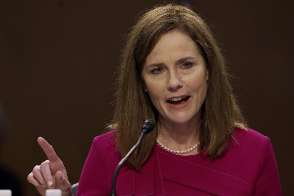Supreme Court nominee Amy Coney Barrett speaks during a confirmation hearing before the Senate Judiciary Committee, Monday, Oct. 12, 2020, on Capitol Hill in Washington. (Win McNamee/Pool via AP)