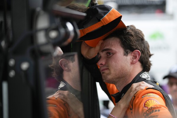Pato O'Ward, of Mexico, reacts after finishing second in the Indianapolis 500 auto race at Indianapolis Motor Speedway, Sunday, May 26, 2024, in Indianapolis. (AP Photo/Darron Cummings)