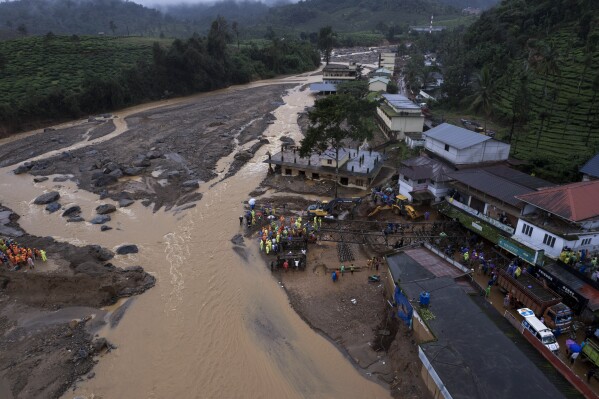 Indian army soldiers set up a prefabricated bridge for across the river rescue operations following Tuesday’s landslides at Chooralmala, Wayanad district, Kerala state, India, Wednesday, July 31, 2024. (AP Photo/Rafiq Maqbool)