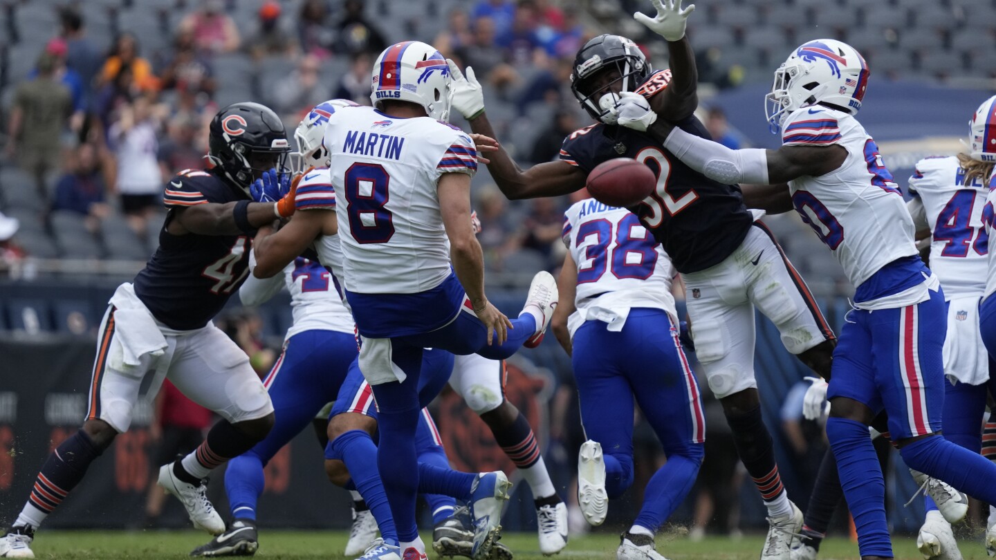 CHICAGO, IL - DECEMBER 24: Buffalo Bills quarterback Josh Allen (17) throws  the football in action during a game between the Buffalo Bills and the  Chicago Bears on December 24, 2022, at