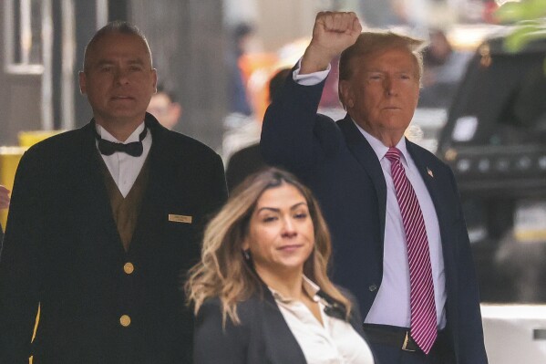 Former president Donald Trump leaves Trump Tower on his way to Manhattan criminal court, Friday, April 19, 2024, in New York. Jury selection in the hush money trial of former President Donald Trump is set to resume after a frenetic day that eventually saw all 12 jurors sworn in along with one alternate juror. (AP Photo/Yuki Iwamura)