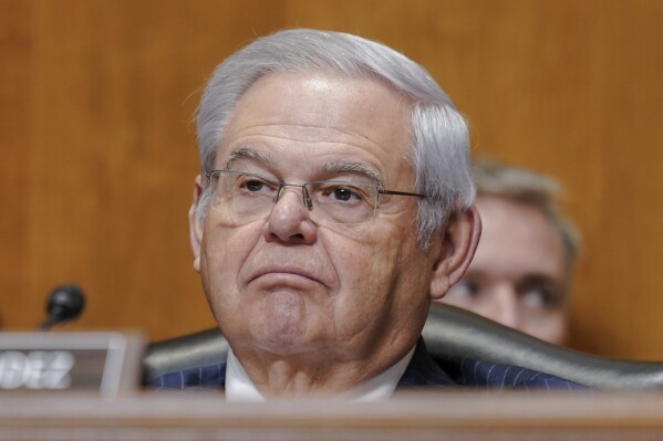 FILE - Sen. Bob Menendez, D-N.J., listens during a Senate Foreign Relations Committee hearing, Thursday, Dec. 7, 2023, on Capitol Hill in Washington. As Democratic Party leaders have called on Bob Menendez to resign amid a federal corruption case against him, a field of robust primary challengers has already emerged has begun to win significant support from county party officials. (AP Photo/Mariam Zuhaib, File)