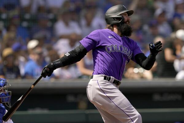 The Colorado Rockies' Charlie Blackmon marches to the beat of his