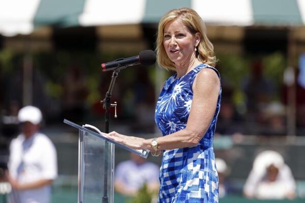 FILE -Chris Evert speaks during the induction ceremony at the International Tennis Hall of Fame in Newport, R.I., Saturday, July 12, 2014. Former tennis star Chris Evert says she was diagnosed with an early stage of ovarian cancer. The 67-year-old Evert revealed the illness in a story posted Friday, Jan. 14, 2022 on ESPN.com. (AP Photo/Michael Dwyer, File)