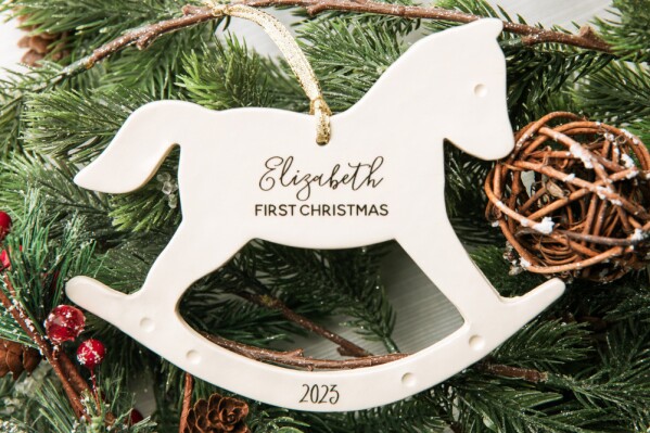 Introducing our Rocking Horse Ornament! This charming piece captures the joy and nostalgia of Christmas with its intricate details and whimsical design. View our entire baby's first Christmas ornament collection at Susabella.com