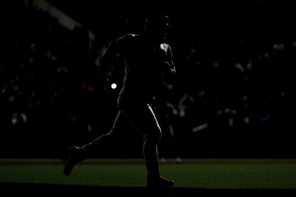 DJ Stewart of the New York Mets runs to home plate after hitting a three-run home run in the bottom of the sixth inning of a baseball game against the Chicago Cubs on Tuesday, April 30, 2024, in New York.  (AP Photo/Julia Nickinson)