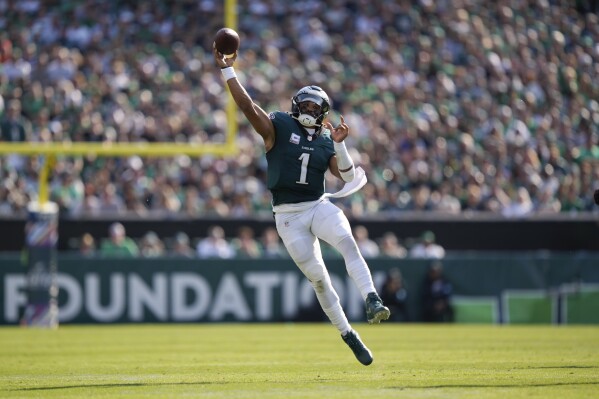 Philadelphia Eagles quarterback Jalen Hurts (1) passes the ball during the second half of an NFL football game against the Cleveland Browns on Sunday, Oct. 13, 2024, in Philadelphia. (AP Photo/Matt Rourke)