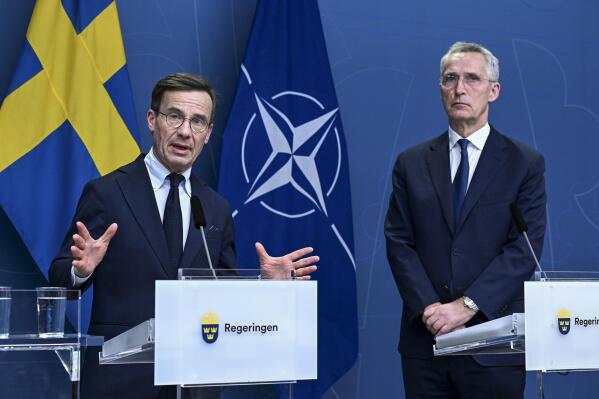 FILE - Sweden's Prime Minister Ulf Kristersson and NATO Secretary General Jens Stoltenberg during a press conference in Stockholm, Sweden, Tuesday, March 7, 2023. Russia is suspected of spying in the waters of the Baltic Sea and North Sea using civilian fishing trawlers, cargo ships and yachts, the public broadcasters of four Nordic countries said in a joint investigation published Wednesday, April 19. Swedish news agency TT quoted Prime Minister Ulf Kristersson as saying he wasn’t surprised by the revelation of Russia's alleged “illegitimate information gathering.” (Jonas Ekstromer/TT News Agency via AP, file)