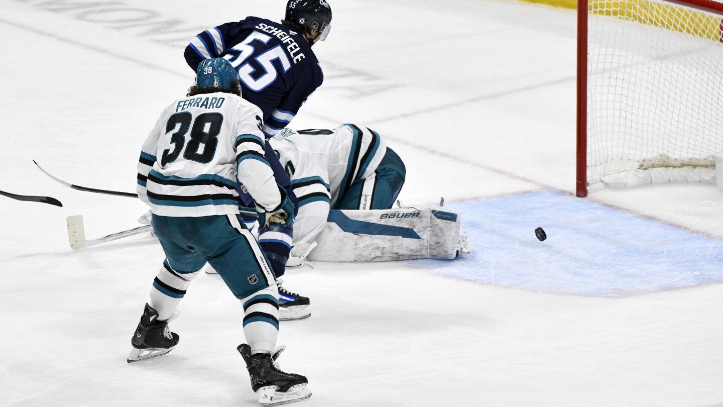 Winnipeg Jets extend record win streak to 10 with OT victory over Sharks