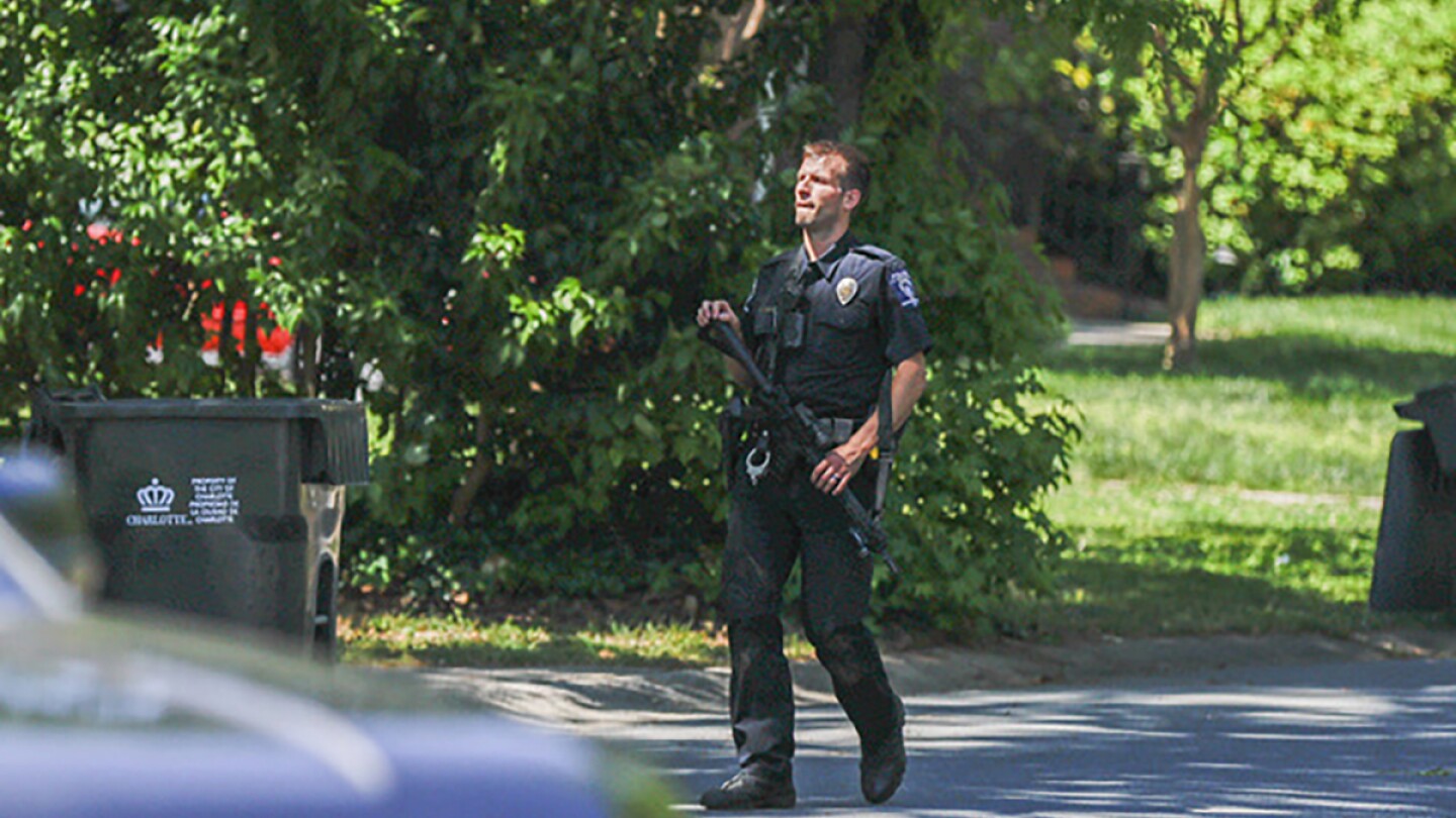 Neighbors share their reasons for recording the scene of a deadly shooting in which four officers were killed and four others wounded Monday in Charlo