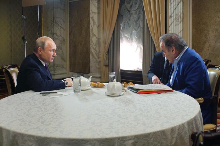Russian President Vladimir Putin, left, speaks during an interview with American movie director Oliver Stone for a documentary in the Kremlin in Moscow, Russia, on Wednesday, June 19, 2019. Putin sent Russian forces into Ukraine on Feb. 24, 2022, and appears determined to prevail. (Alexei Druzhinin, Sputnik, Kremlin Pool Photo via AP, File)