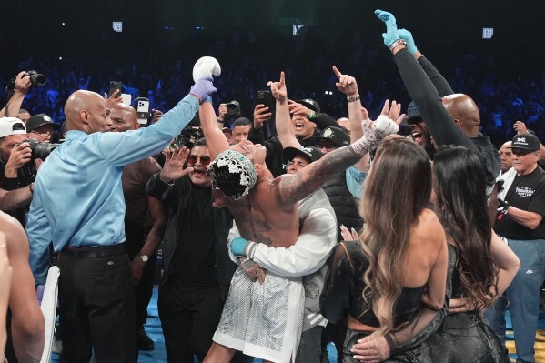 Ryan Garcia celebrates after winning a super lightweight boxing match against Devin Haney early Sunday, April 21, 2024, in New York. (AP Photo/Frank Franklin II)